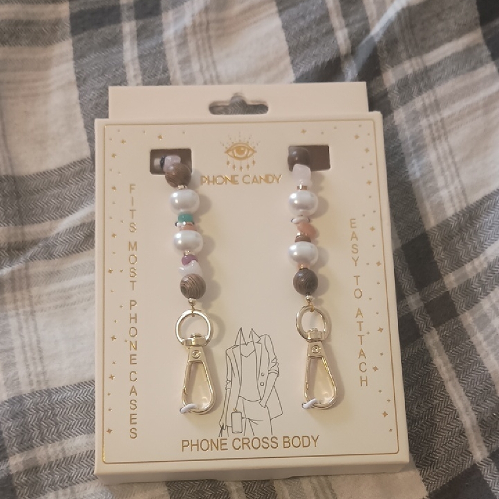 NIB / NWT Phone Eye Candy Cell Phone Crossbody Chain. NEVER OPENED, PERFECTION